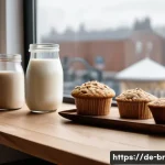 알레르기 유발 식품 대체 레시피 - A cozy modern kitchen scene featuring an assortment of plant-based milk alternatives on a wooden cou...